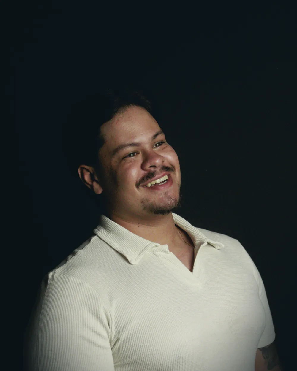 Humberley Cezilio sorrindo, de camisa polo clara